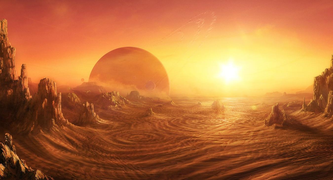 Dawn on the planet Surn, the baking twin suns creep over the horizon.