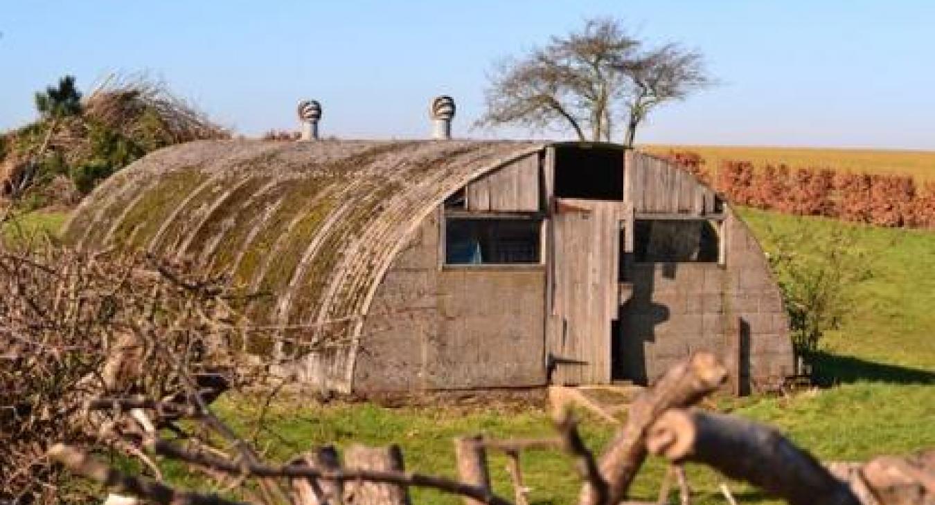 Old war shelter above ground. How ever were people supposed to be safe from bombs dropping in this little shelter?